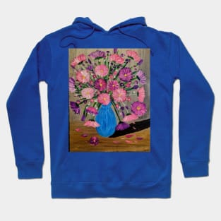 Vibrant pink and purple flowers bloom tall in a striking blue vase, adorned with touches of metallic paint for an extra shimmer Hoodie